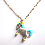 Pretty Kitsch Blue, Yellow and Silver Fairground Unicorn Pendant Necklace